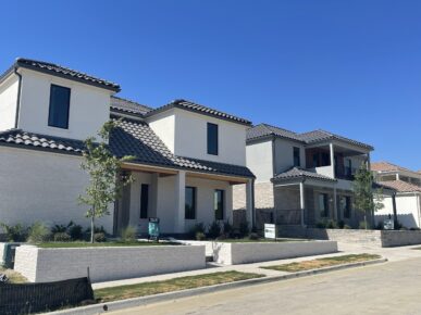 A row of new homes in a neighborhood.