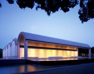 The building is lit up at night.