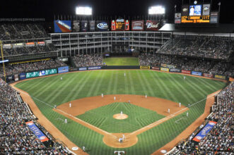 A baseball field at night.